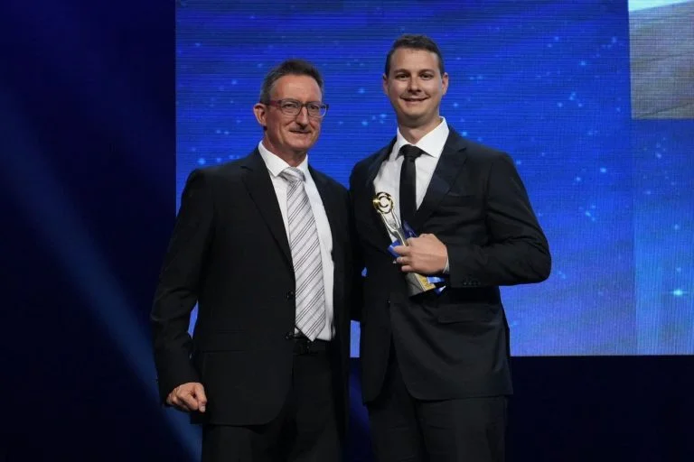 Owner Michael Swan, on stage accepting the Small Business Campion Award