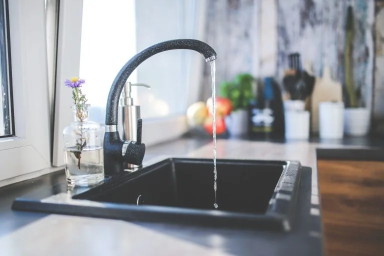 Plumbing services, changing a tap